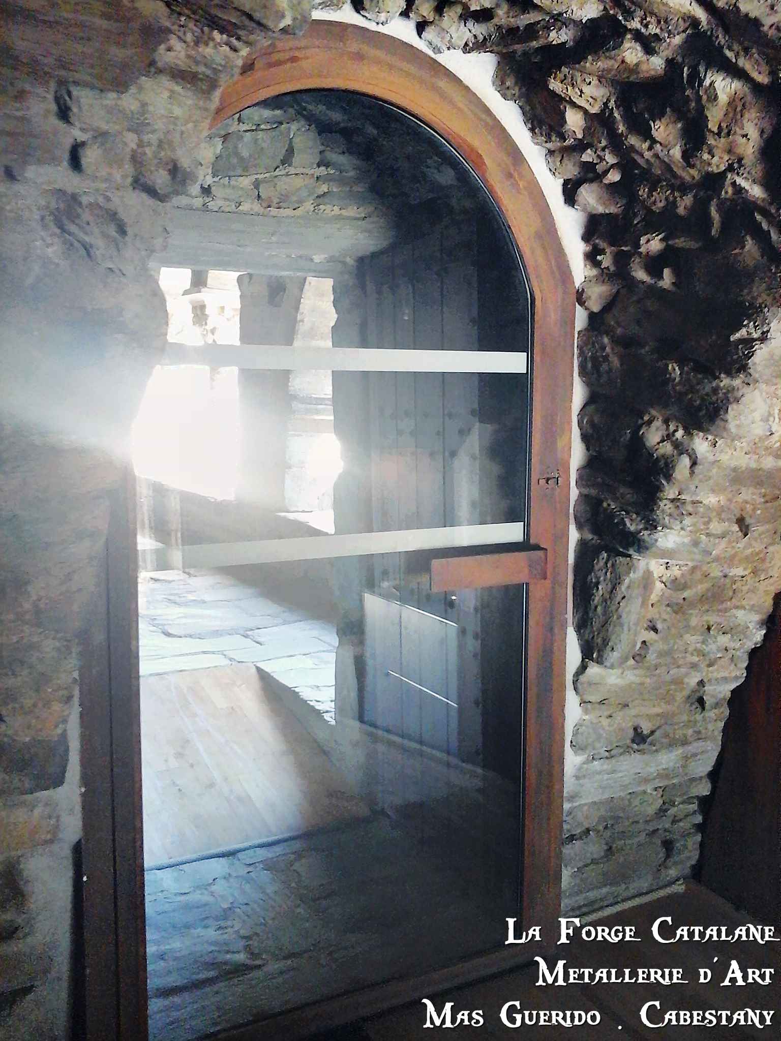 porte cintre corten vitrage vitre prieure de serrabone conseil general 66 forge catalane 3.jpg